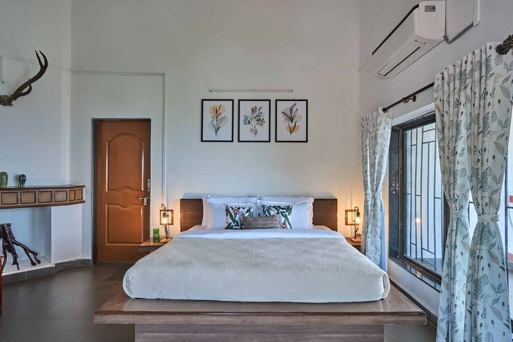 Bedroom with botanical prints
